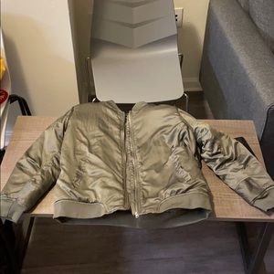 A green bomber jacket